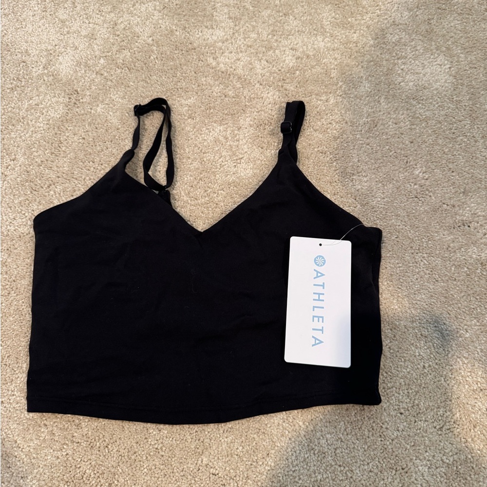 NEVER BEEN WORN. NEW WITH TAGS 
ATHLETA Elation V Neck longline bra
Size XS